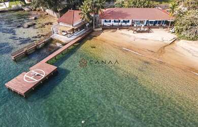 Imagem: A casa possui 5 Dormitórios, 5 Banheiros, 5 Vagas na garagem