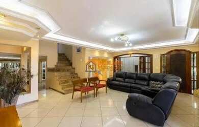 Imagem: A casa possui 3 Dormitórios, 4 Banheiros, 4 Vagas na garagem