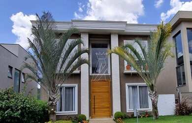 Imagem: A casa em condomínio possui 4 Dormitórios, 5 Banheiros, 2