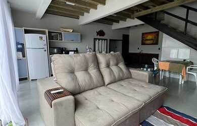 Imagem: A casa possui 3 Dormitórios, 2 Vagas na garagem e está localizado