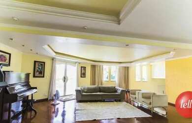 Imagem: A casa possui 4 Dormitórios, 4 Banheiros, 5 Vagas na garagem