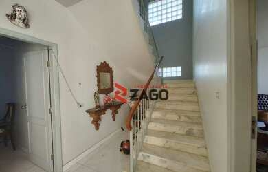 Imagem: A casa possui 4 Dormitórios, 4 Banheiros, 3 Vagas na garagem