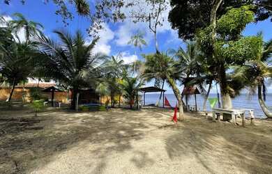 Imagem: A casa possui 4 Dormitórios, 5 Vagas na garagem e está localizado