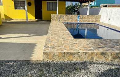 Imagem: A casa em condomínio possui 2 Dormitórios, 3 Banheiros, 2