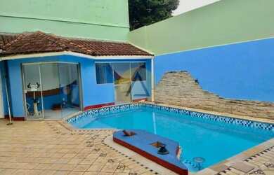 Imagem: A casa possui 5 Dormitórios, 5 Banheiros, 3 Vagas na garagem