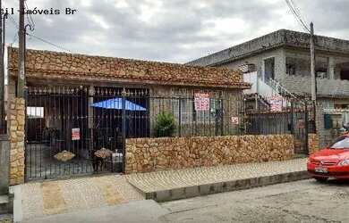 Imagem: A casa possui 3 Dormitórios, 2 Banheiros, 3 Vagas na garagem