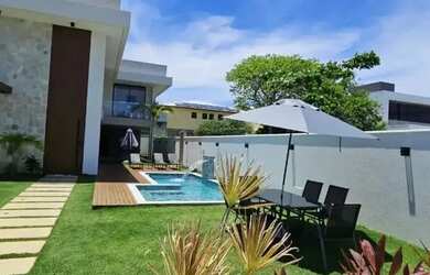 Imagem: A casa possui 5 Dormitórios, 5 Banheiros, 2 Vagas na garagem