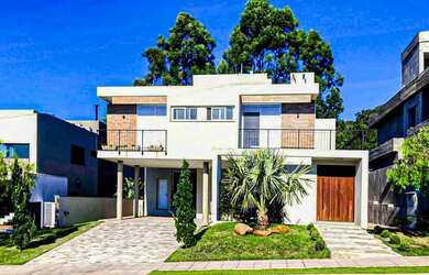 Imagem: A casa em condomínio possui 3 Dormitórios, 4 Banheiros, 2