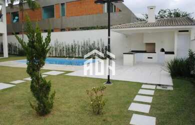 Imagem: A casa possui 4 Dormitórios, 5 Banheiros, 5 Vagas na garagem