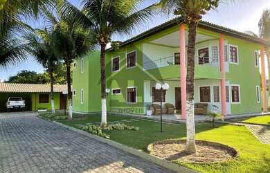 Imagem: A casa possui 5 Dormitórios, 4 Banheiros, 5 Vagas na garagem