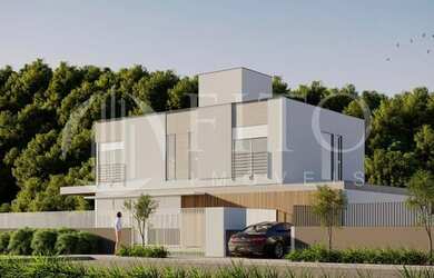 Imagem: A casa possui 4 Dormitórios, 5 Banheiros, 2 Vagas na garagem