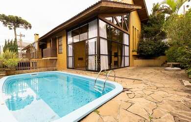 Imagem: A casa em condomínio possui 4 Dormitórios, 4 Banheiros, 3