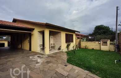 Imagem: A casa possui 3 Dormitórios, 1 Banheiro e 100m² de Área e