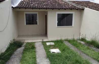 Imagem: A casa possui 2 Dormitórios, 1 Banheiro, 2 Vagas na garagem