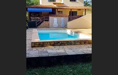 Imagem: A casa possui 5 Dormitórios, 5 Vagas na garagem e está localizado