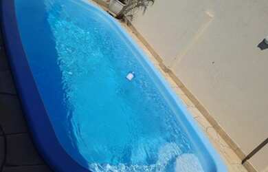 Imagem: A casa possui 2 Dormitórios, 1 Banheiro, 2 Vagas na garagem