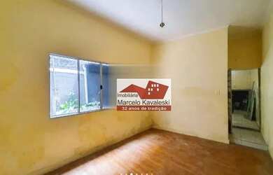 Imagem: A casa possui 2 Dormitórios, 1 Banheiro, 2 Vagas na garagem