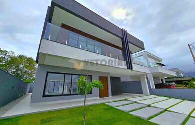 Imagem: A casa em condomínio possui 5 Dormitórios, 5 Banheiros, 4