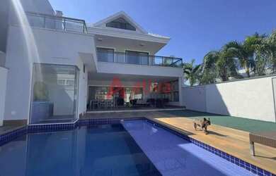 Imagem: A casa em condomínio possui 3 Dormitórios, 4 Banheiros, 3