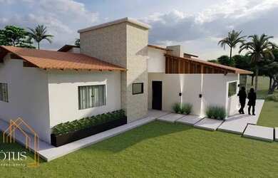 Imagem: A casa possui 3 Dormitórios, 3 Banheiros, 4 Vagas na garagem