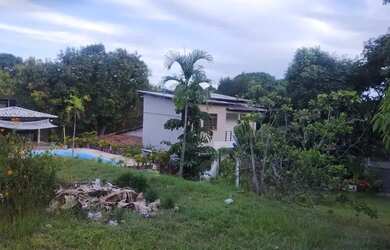 Imagem: A casa possui 5 Dormitórios, 5 Banheiros, 5 Vagas na garagem