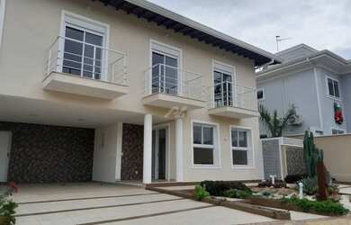 Imagem: A casa em condomínio possui 5 Dormitórios, 5 Banheiros, 2