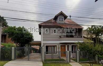 Imagem: A casa em condomínio possui 4 Dormitórios, 4 Banheiros, 3