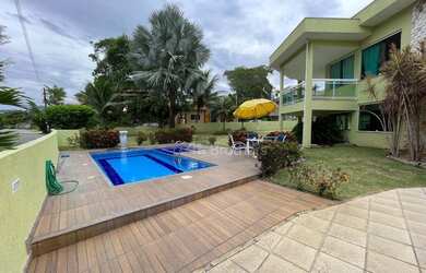 Imagem: A casa possui 3 Dormitórios, 4 Banheiros, 4 Vagas na garagem