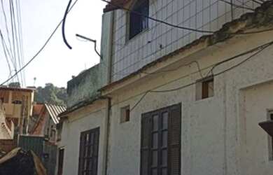 Imagem: A casa possui 4 Dormitórios, 2 Banheiros, 168m² de Área e