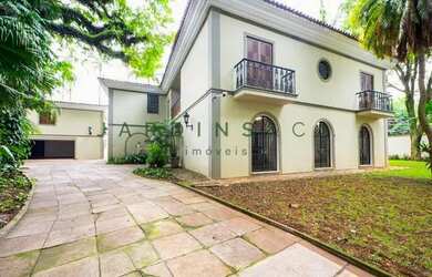 Imagem: A casa possui 5 Dormitórios, 4 Banheiros, 5 Vagas na garagem