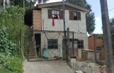 Imagem: A casa possui 2 Dormitórios, 1 Banheiro, 102m² de Área e