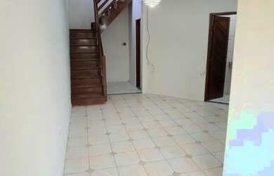 Imagem: A casa possui 3 Dormitórios, 2 Banheiros, 2 Vagas na garagem