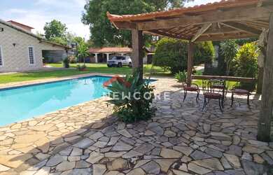 Imagem: A casa possui 3 Dormitórios, 3 Banheiros, 5 Vagas na garagem