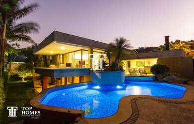 Imagem: A casa em condomínio possui 5 Dormitórios, 5 Banheiros, 5