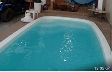 Imagem: A casa possui 2 Dormitórios, 2 Banheiros, 1 Vaga na garagem