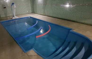 Imagem: A casa e possui 3 Dormitórios, Suítes, Banheiros, 3 Vagas