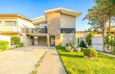 Imagem: A casa em condomínio possui 4 Dormitórios, 5 Banheiros, 5