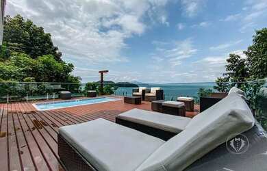 Imagem: O apartamento possui 5 Dormitórios, 5 Banheiros, 2 Vagas na