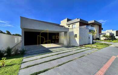 Imagem: A casa possui 4 Dormitórios, 5 Banheiros, 4 Vagas na garagem