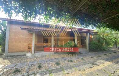 Imagem: A casa possui 3 Dormitórios, 3 Banheiros, 3 Vagas na garagem