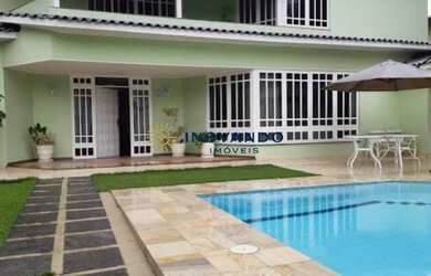 Imagem: A casa em condomínio possui 4 Dormitórios, 5 Banheiros, 3