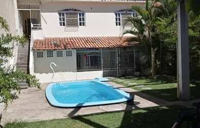 Imagem: A casa possui 5 Dormitórios, 3 Banheiros, 4 Vagas na garagem