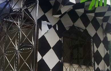 Imagem: A casa possui 3 Dormitórios e 1 Banheiro e está localizado