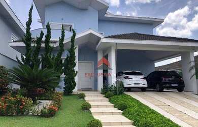 Imagem: A casa possui 3 Dormitórios, 5 Banheiros, 4 Vagas na garagem