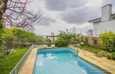 Imagem 2: Casa 3 dormitórios/quartos, sendo uma suite com hidromassagem, com piscina,...