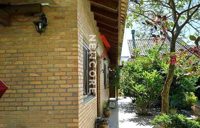 Imagem: A casa em condomínio possui 3 Dormitórios, 3 Banheiros, 2