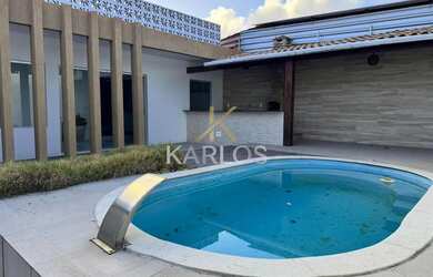 Imagem: A casa possui 3 Dormitórios, 2 Banheiros, 5 Vagas na garagem