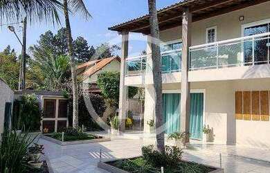 Imagem: A casa em condomínio possui 5 Dormitórios, 5 Banheiros, 4