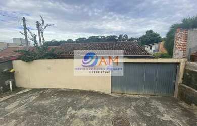 Imagem: A casa possui 3 Dormitórios, 1 Banheiro, 2 Vagas na garagem