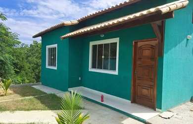 Imagem: A casa possui 2 Dormitórios, 1 Banheiro, 2 Vagas na garagem